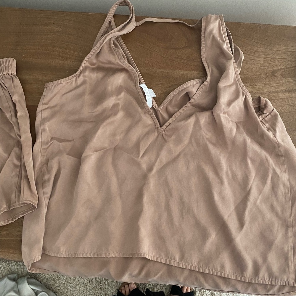 Small Lunya washable silk. Worn a few times and washed twice but I gained weight